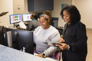 GI Specialists of Georgia staff member is candidly working