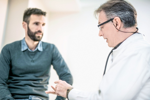 Doctor advising patient during consultation