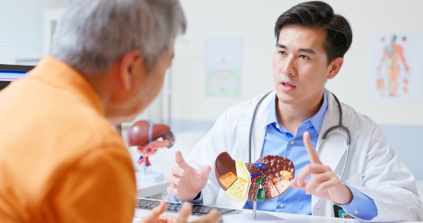 Gastroenterologist explaining procedure to patient