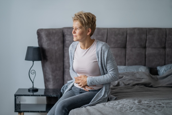 Woman with stomach discomfort